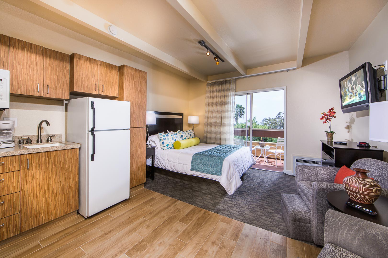 A studio unit with a kitchenette at VRI's San Clemente Inn in California.